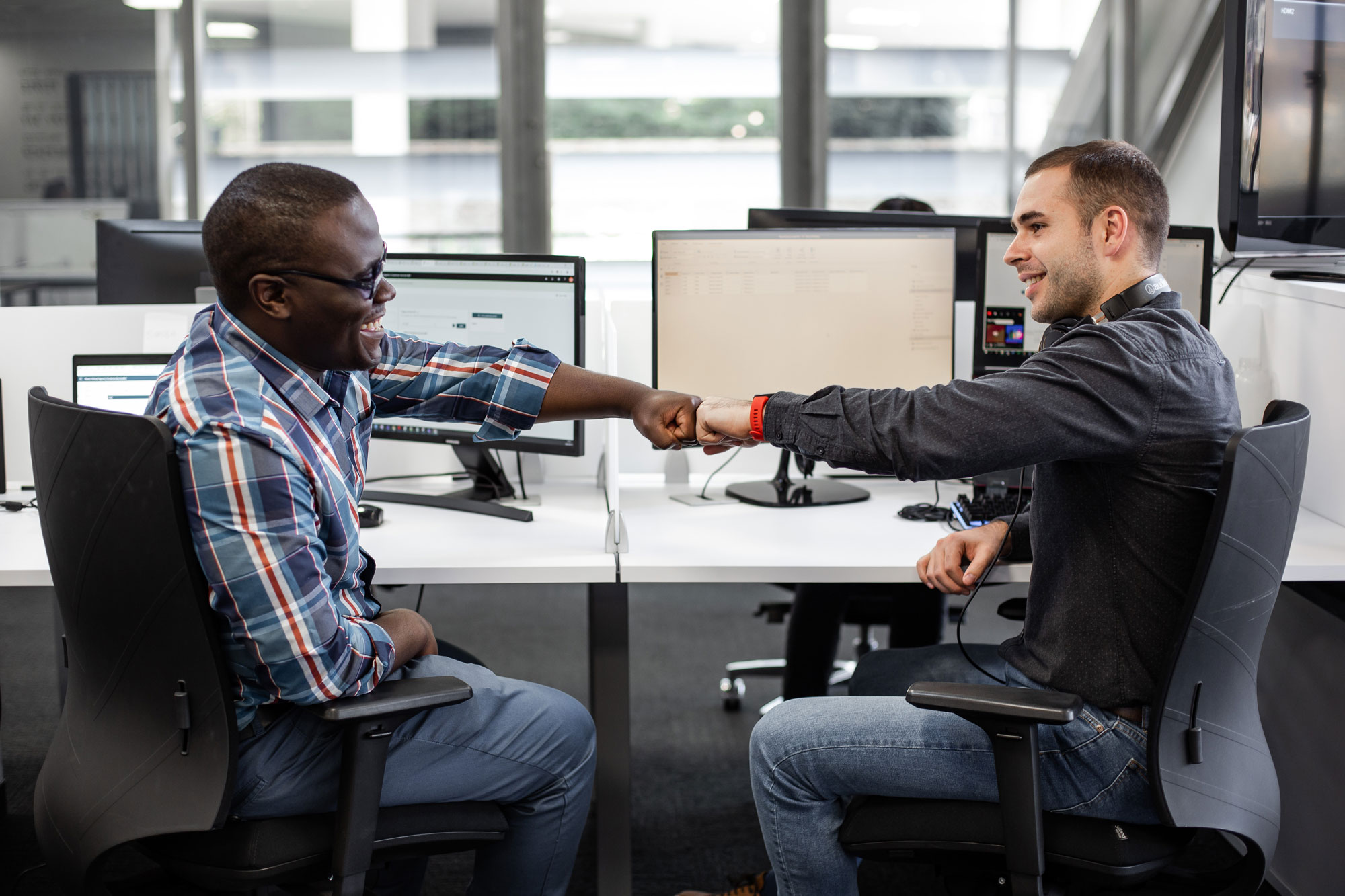 Office Men Fist Bumping